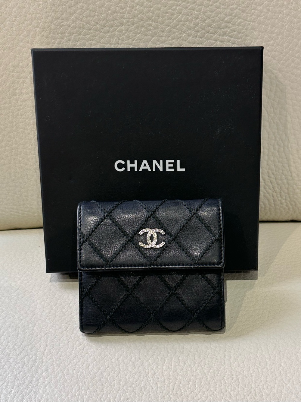 CHANEL Black Quilted Leather Compact Wallet with Silver CC Emblem